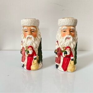 Set of 2 Christmas hand painted ceramic candle holders. Approximately 5” tall.